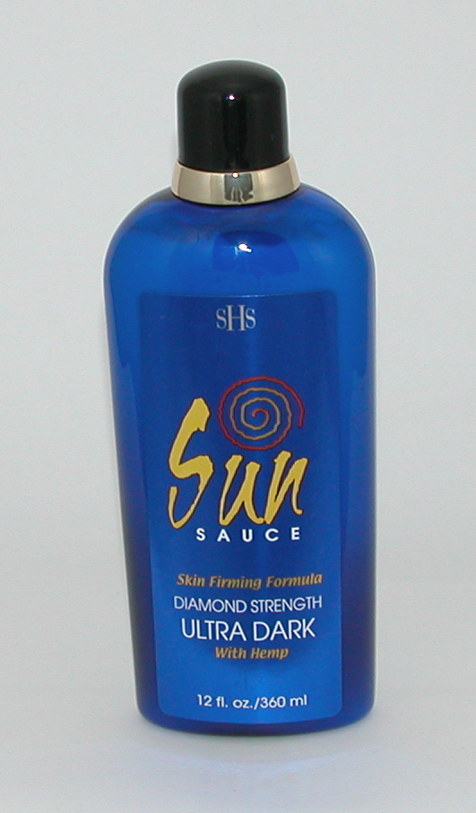 Blue bottle of indoor tanning lotion with ultra-dark wording